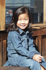 Little Girl Smiling Sitting